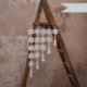 The Akelej Wallhanging placed on a latter